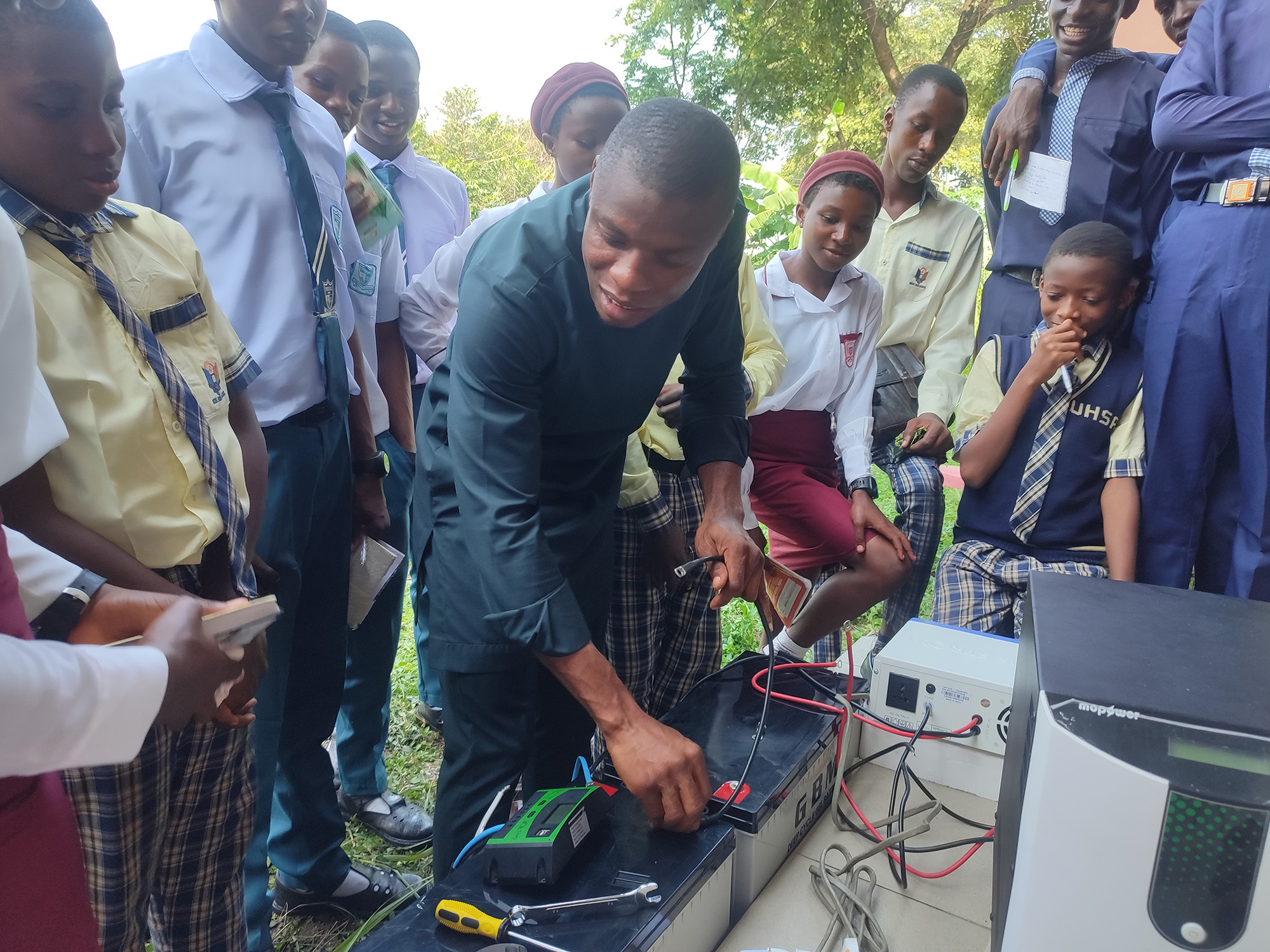 Our expert instructor guiding the students through the process of installing solar panels and emphasizing the importance of renewable energy sources.